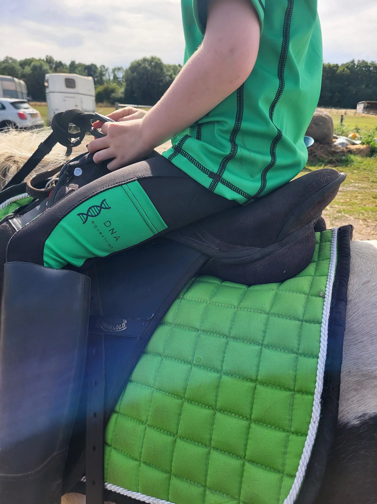 Childrens riding tights in green/black DNA equestrian ltd