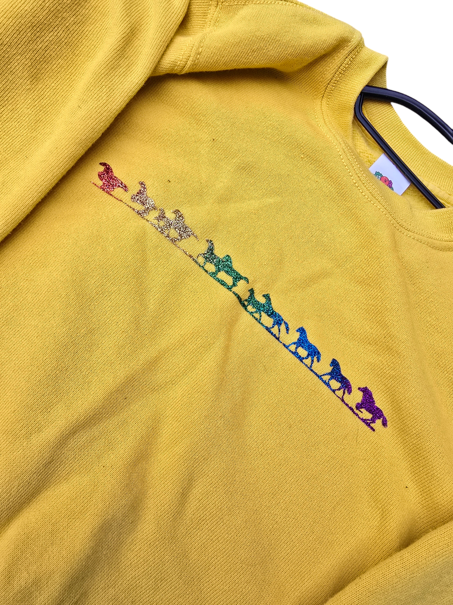 Yellow childrens sweatshirt rainbow glitter horses.